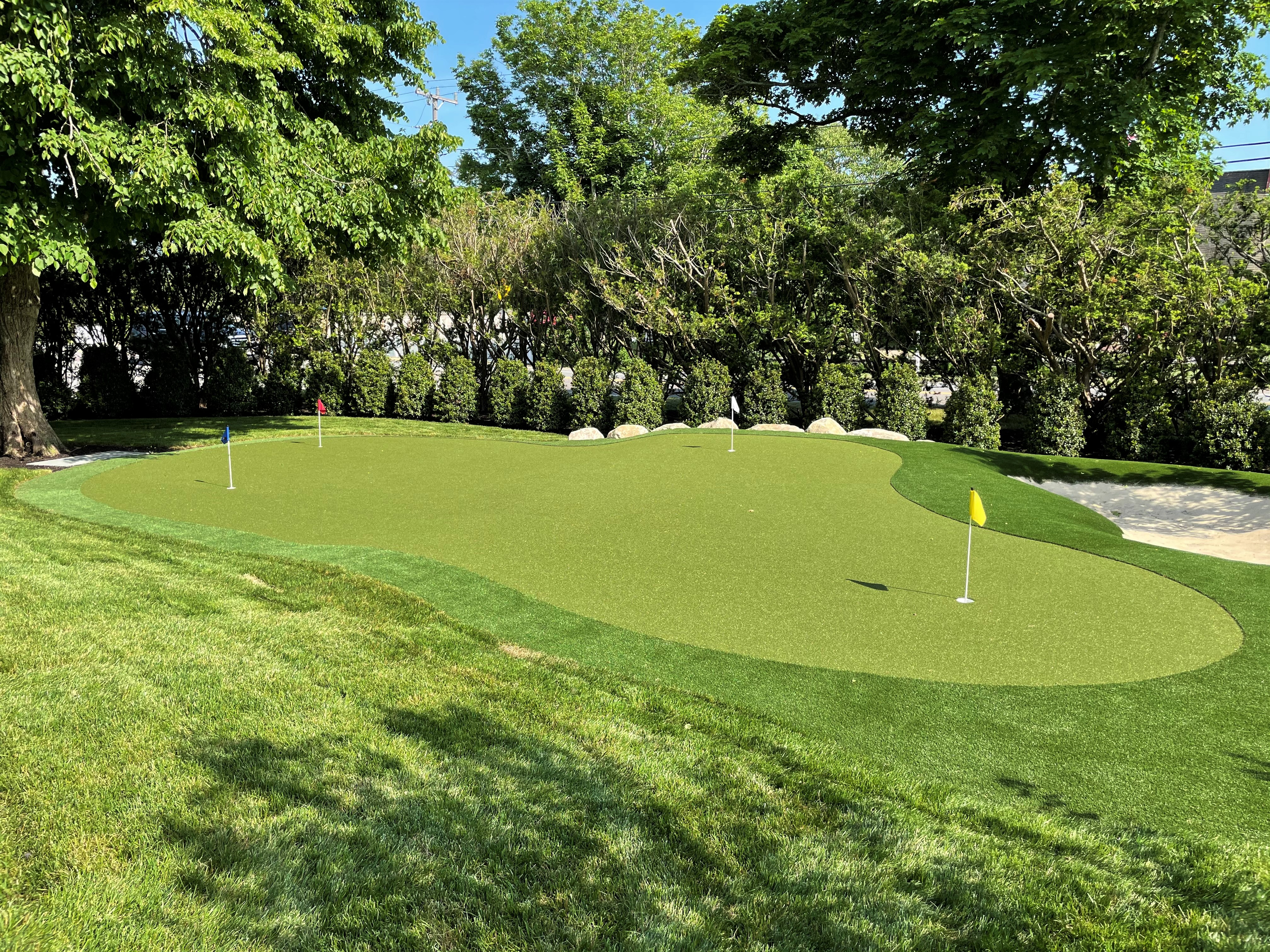 putting green with planting